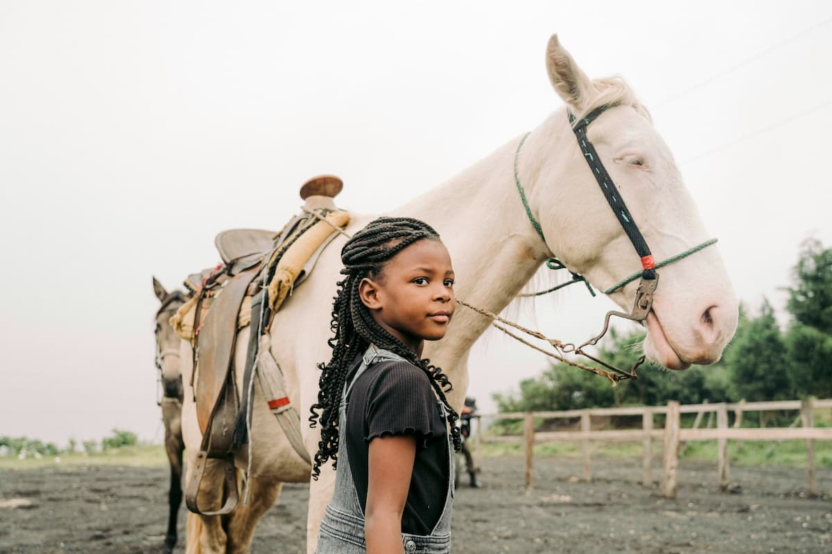 Young girl with a horse